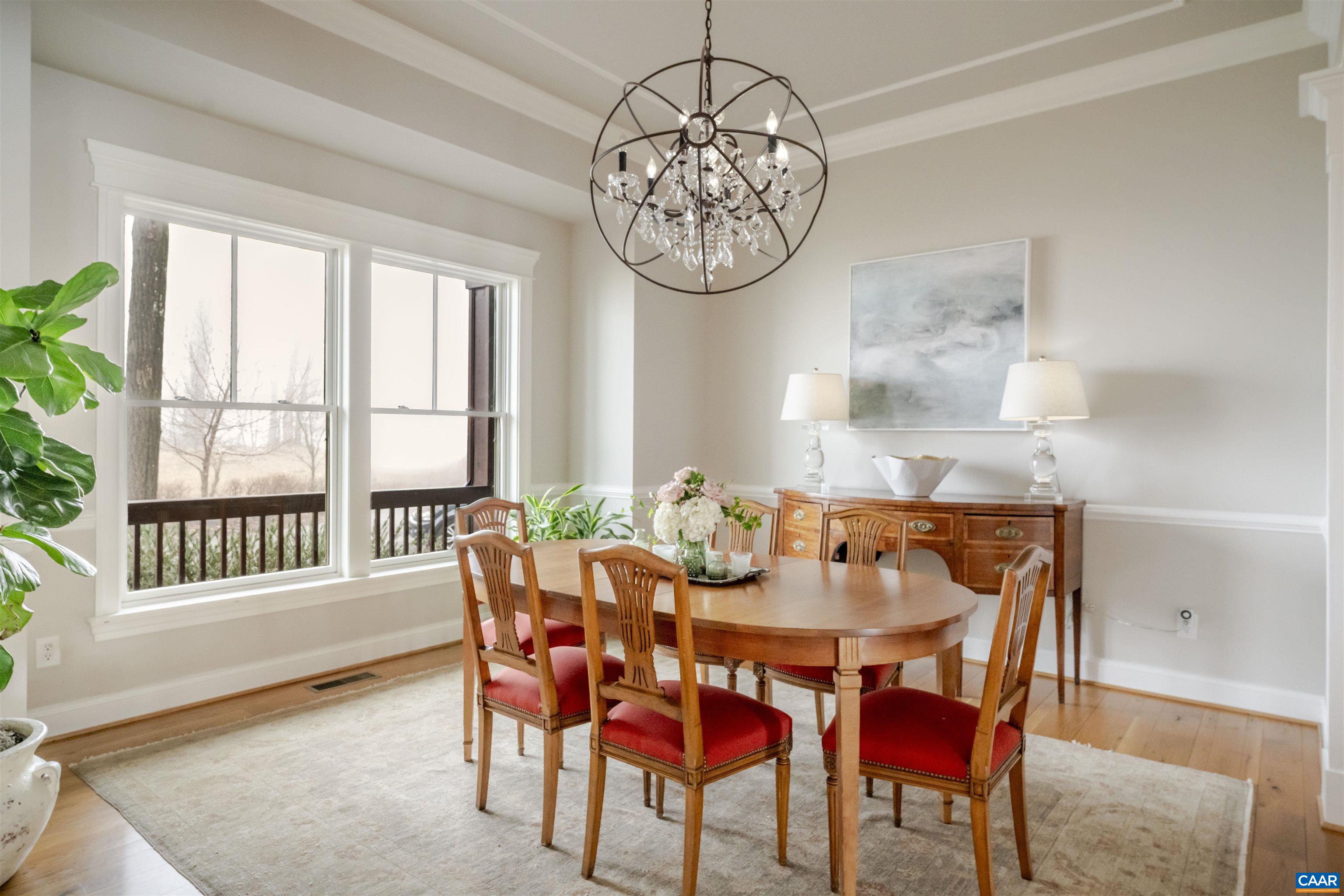 765 Summit Ridge Point Charlottesville, VA 22911 - Photo 14 of 60 a view of a dining room with furniture window and outside view