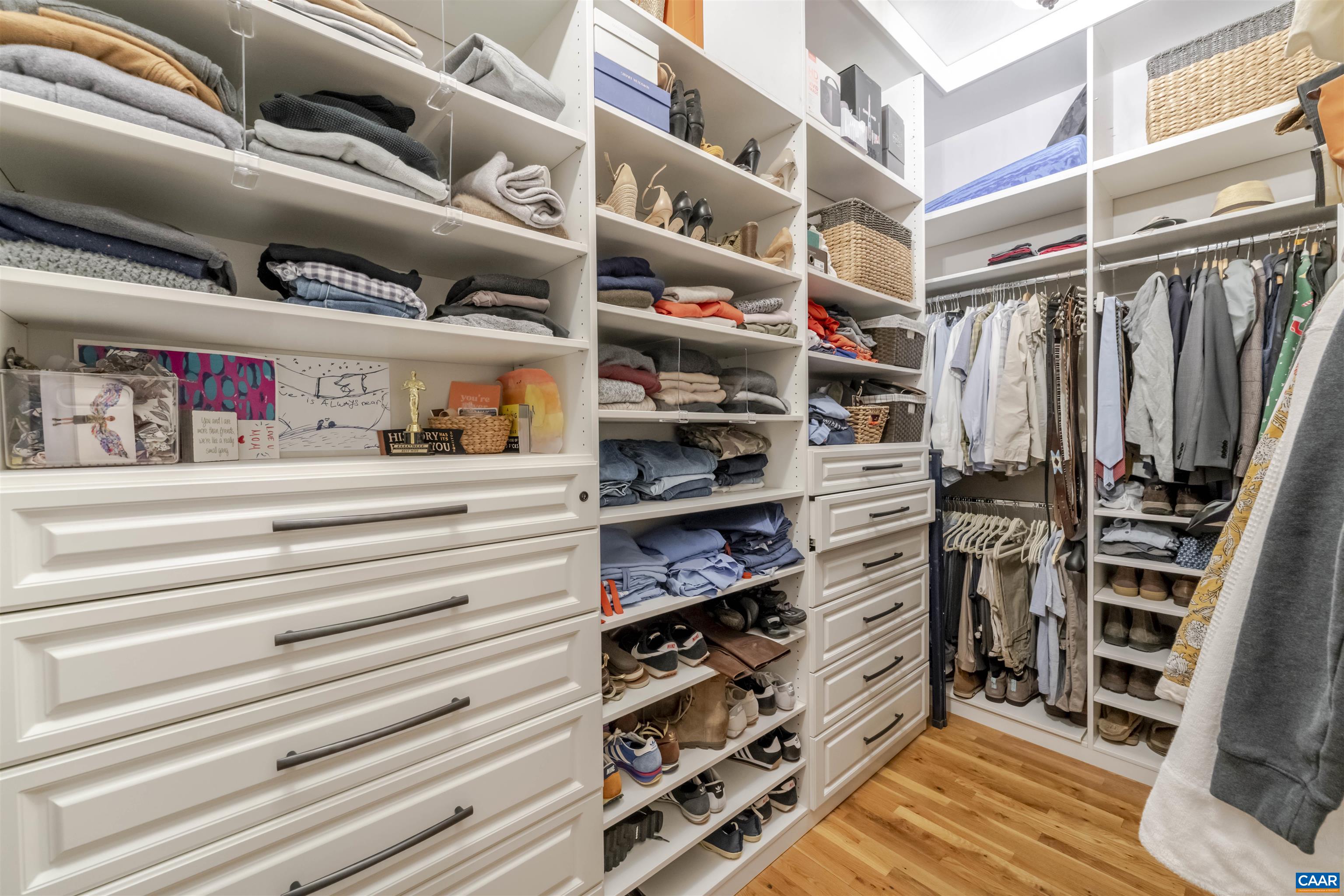 765 Summit Ridge Point Charlottesville, VA 22911 - Photo 20 of 60 a view of walk in closet with clothes and shoes