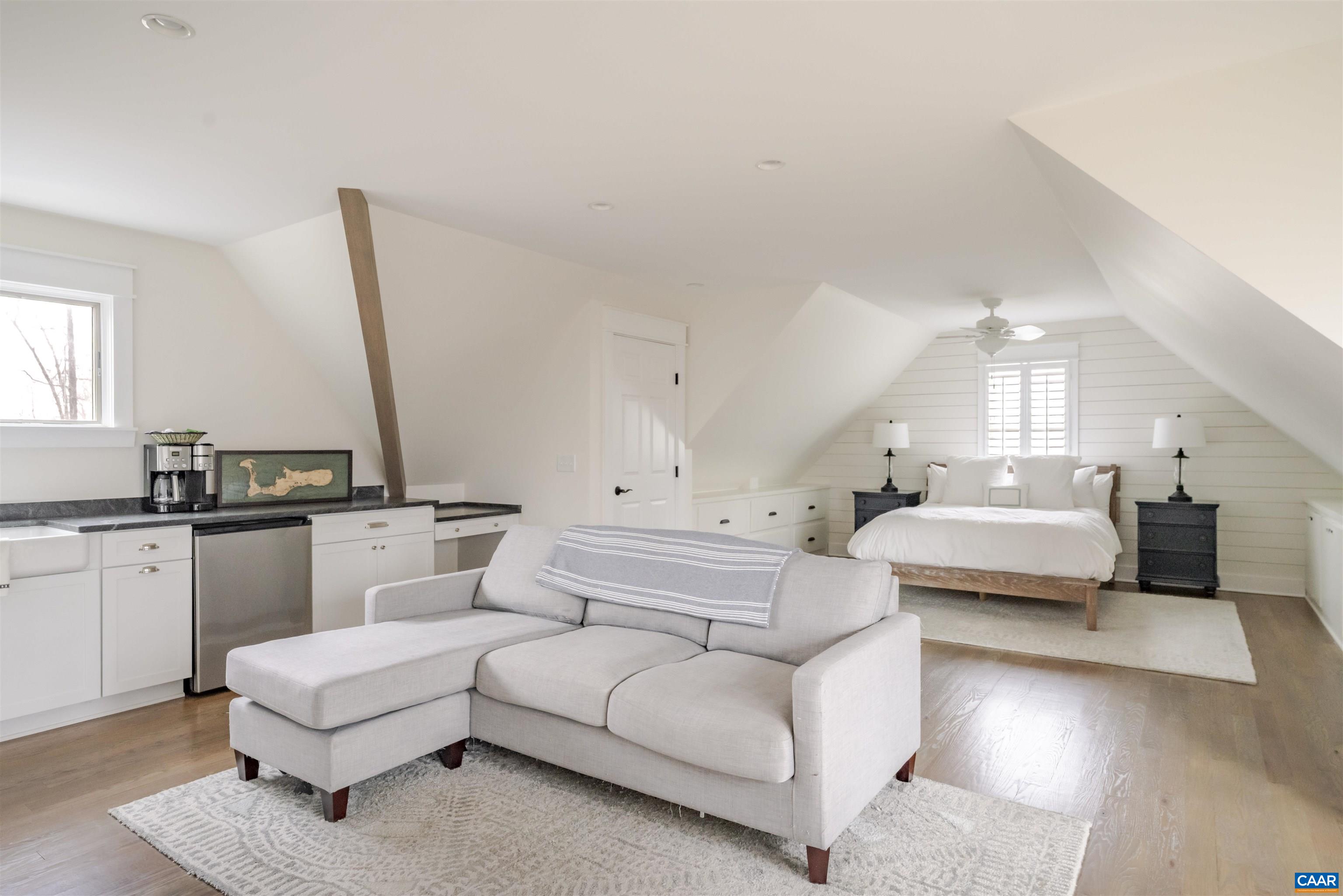 765 Summit Ridge Point Charlottesville, VA 22911 - Photo 24 of 60 a living room with furniture and white walls