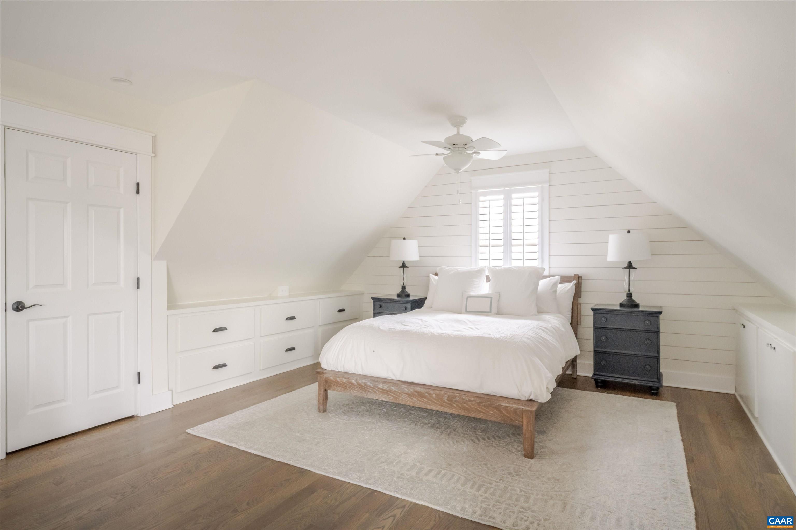 765 Summit Ridge Point Charlottesville, VA 22911 - Photo 26 of 60 a spacious bedroom with a bed and a window