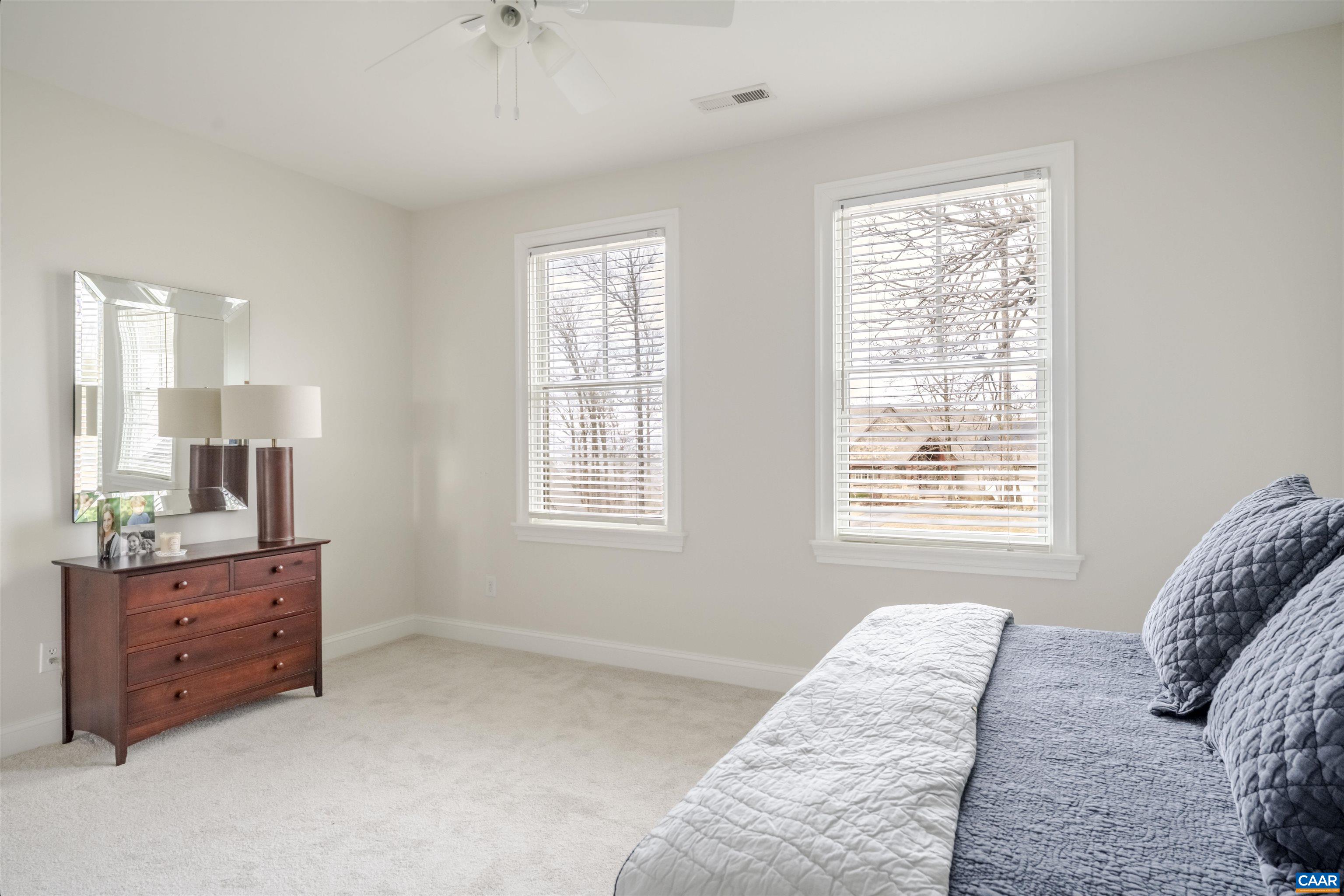 765 Summit Ridge Point Charlottesville, VA 22911 - Photo 36 of 60 a bedroom with a bed and a window