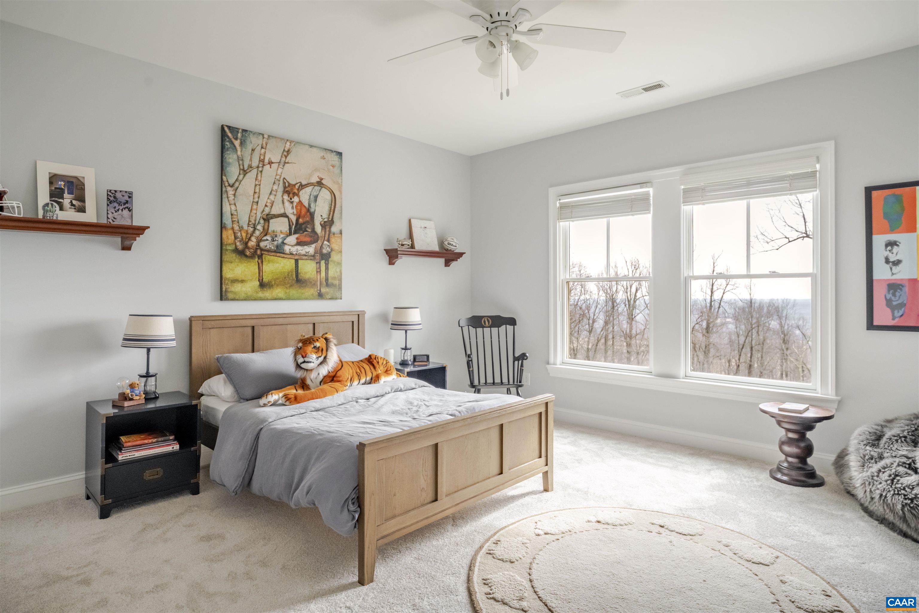 765 Summit Ridge Point Charlottesville, VA 22911 - Photo 37 of 60 a bedroom with furniture and a large window