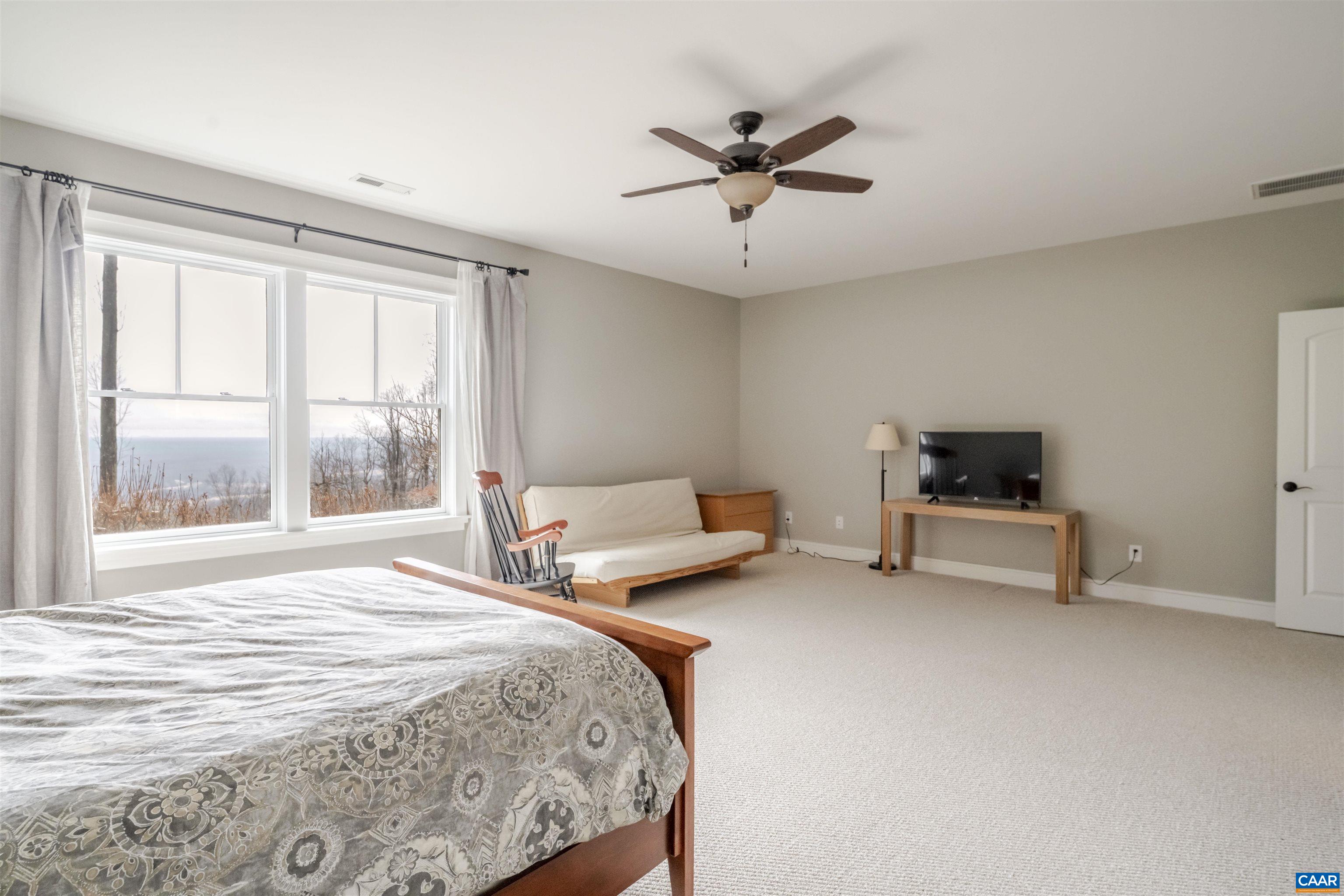 765 Summit Ridge Point Charlottesville, VA 22911 - Photo 47 of 60 a bedroom with a bed and a window