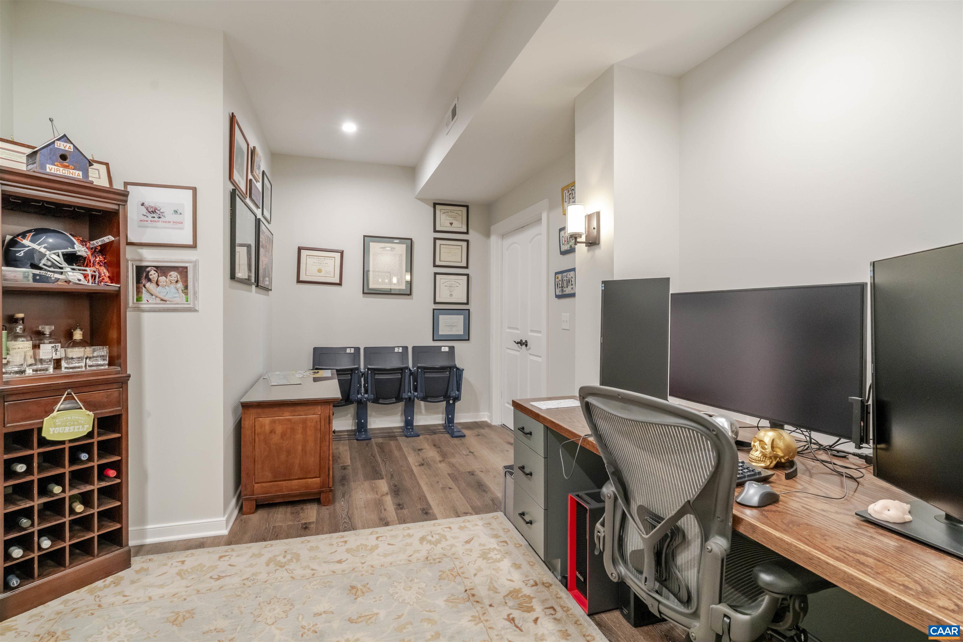 765 Summit Ridge Point Charlottesville, VA 22911 - Photo 50 of 60 a workspace with furniture and chandelier
