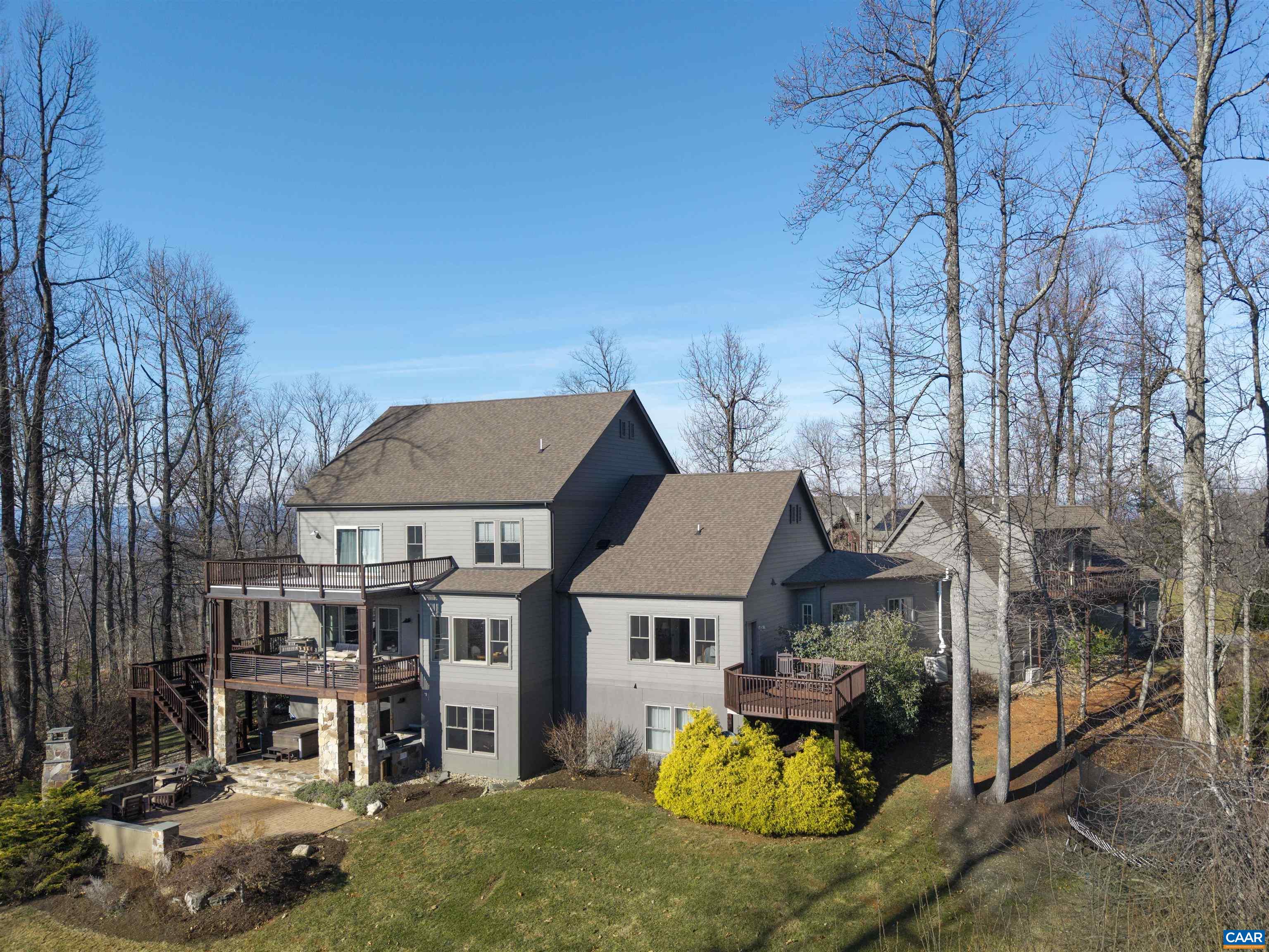 765 Summit Ridge Point Charlottesville, VA 22911 - Photo 60 of 60 a view of a big house with a big yard and large tree