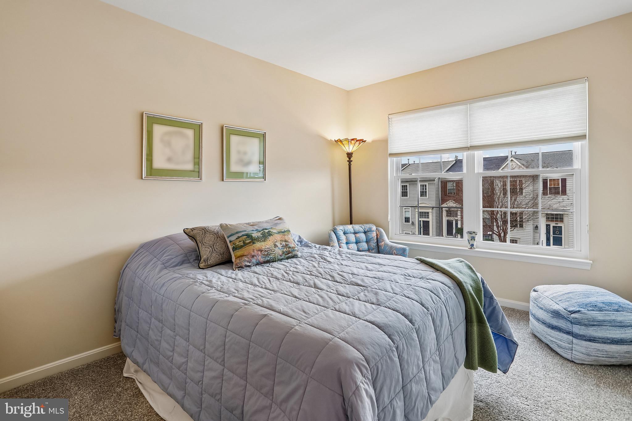 1520 Laurel Wood Way Frederick, MD 21701 - Photo 23 of 30 a bedroom with bed and a window