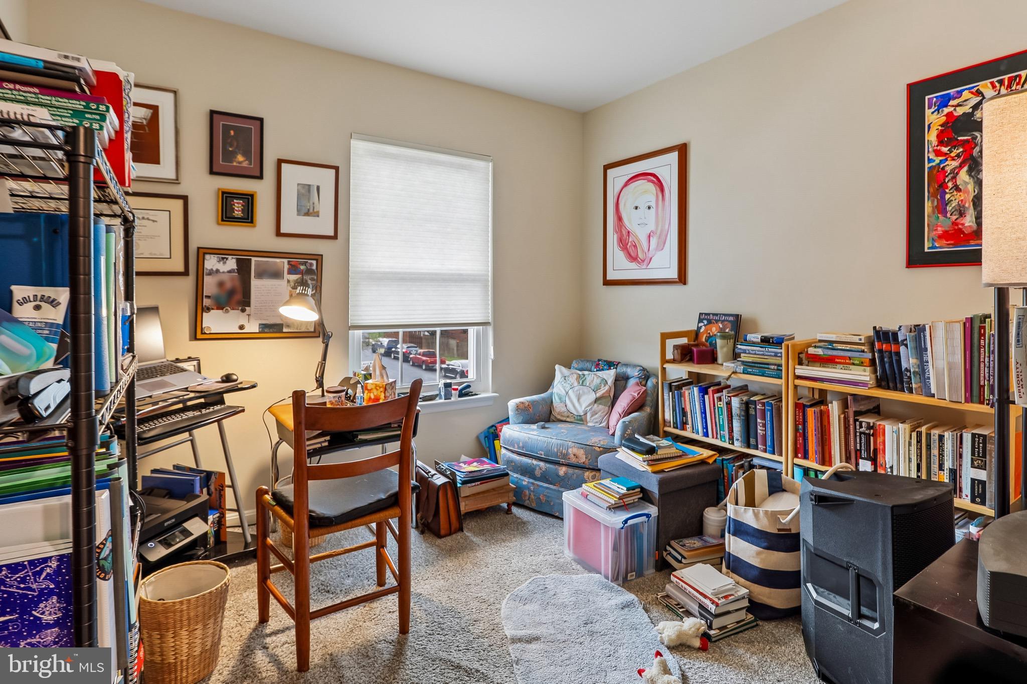 1520 Laurel Wood Way Frederick, MD 21701 - Photo 25 of 30 a living room with furniture toys and a book shelf