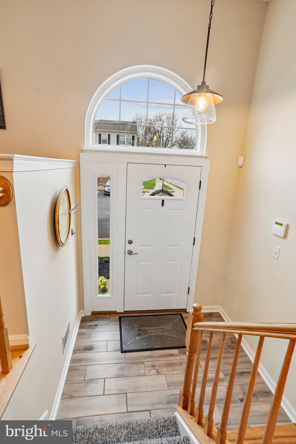 1520 Laurel Wood Way Frederick, MD 21701 - Photo 6 of 30 a view of an entryway with a hardwood