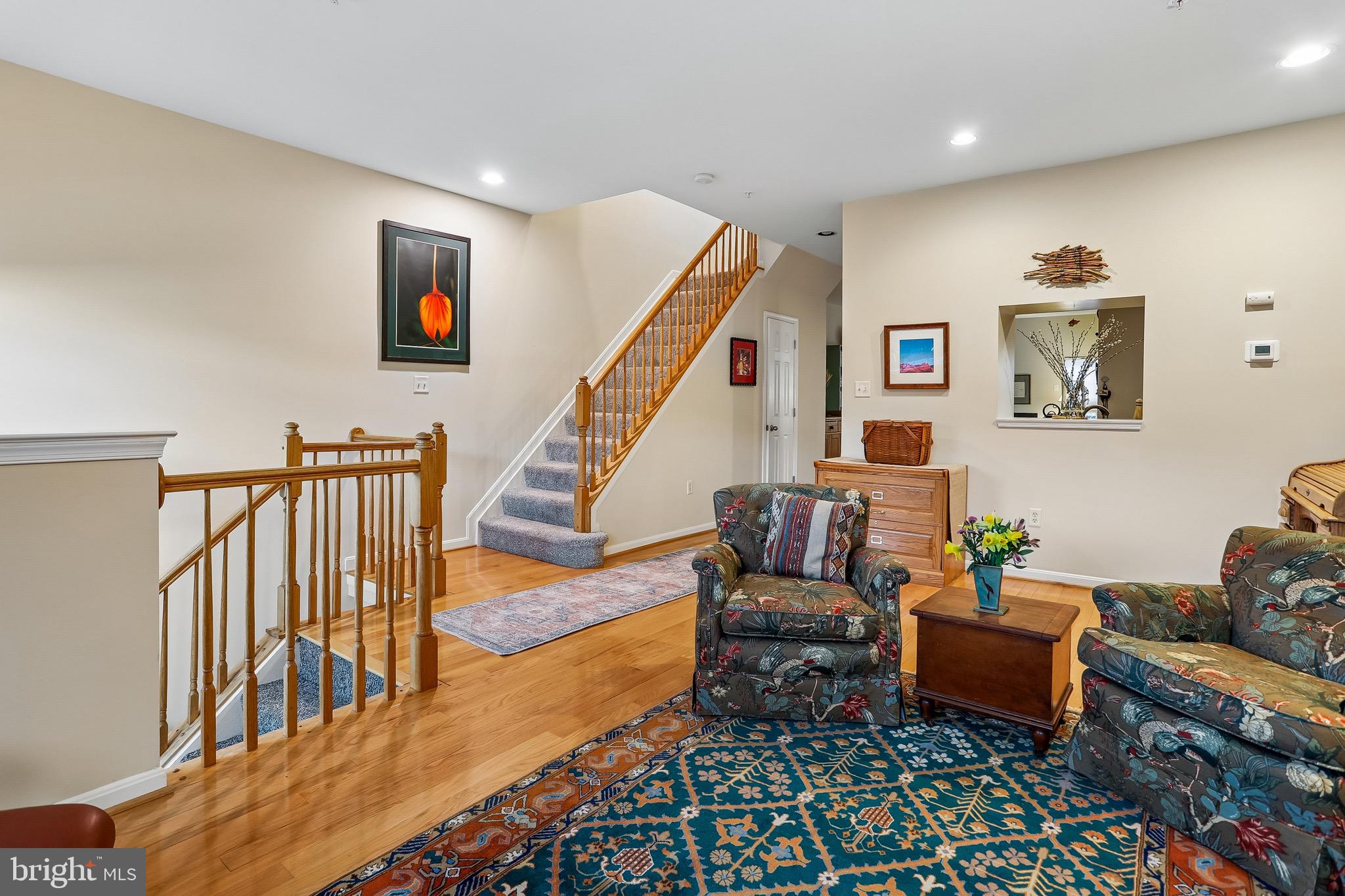 1520 Laurel Wood Way Frederick, MD 21701 - Photo 8 of 30 a living room with furniture and stairs