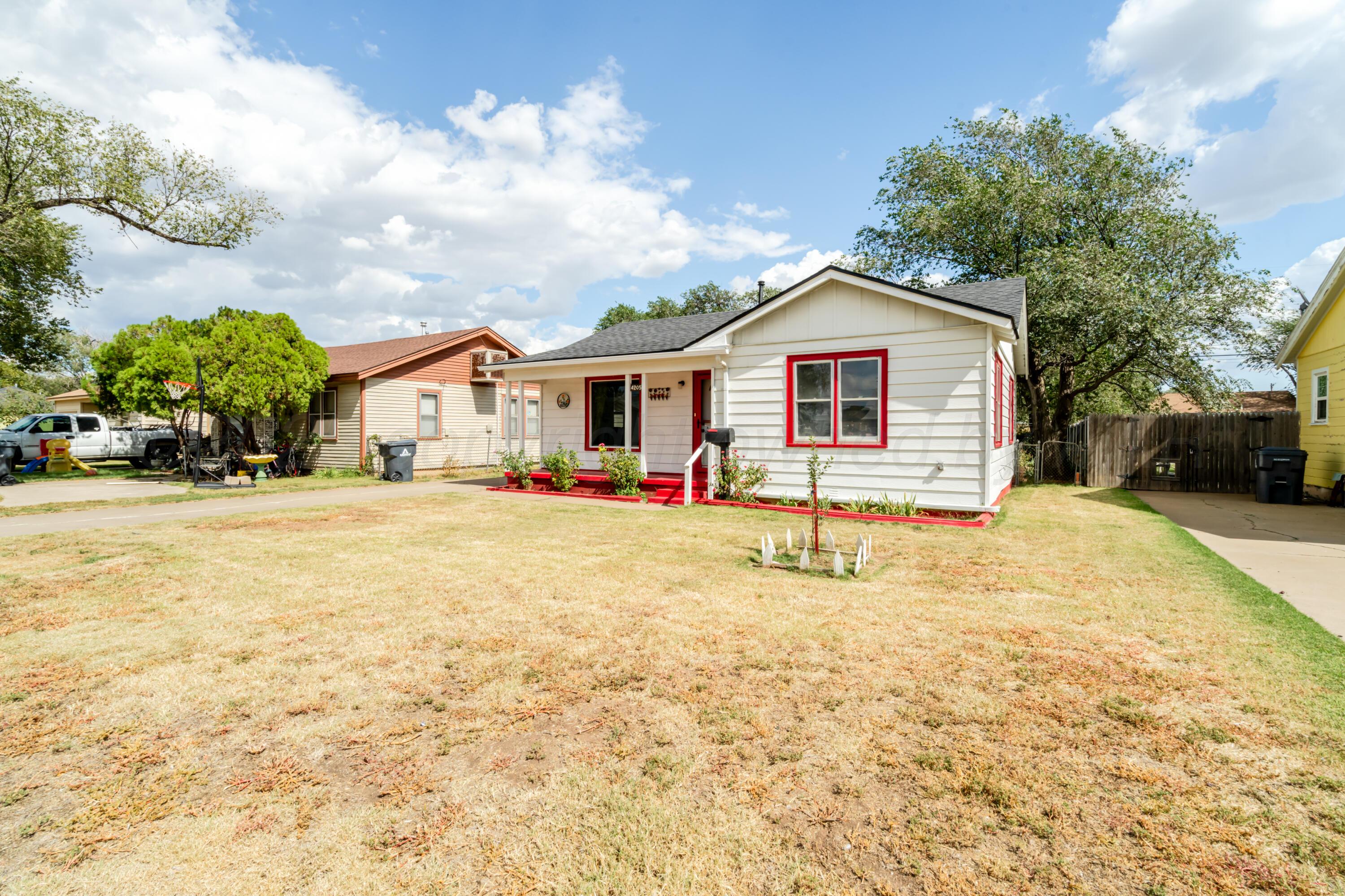 4205 South Jackson Street Amarillo, TX 79110 - Photo 1 of 22 a view of backyard of the house