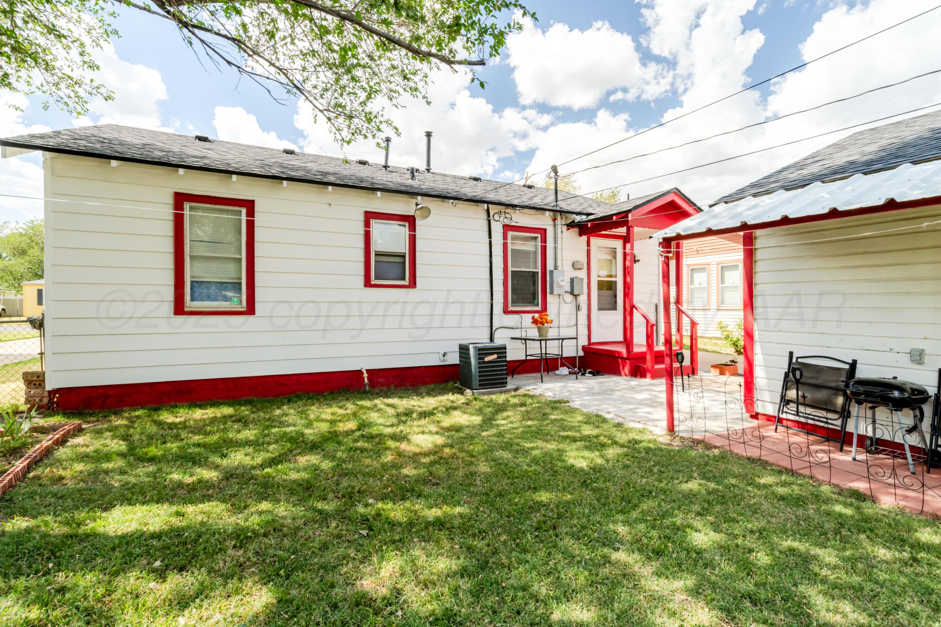 4205 South Jackson Street Amarillo, TX 79110 - Photo 22 of 22 a view of a backyard with a patio