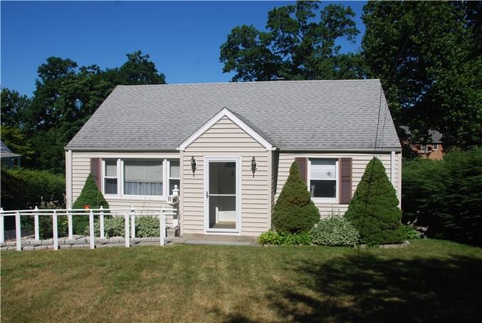 11 Chelene Road Norwalk, CT 06851 - Photo 1 of 1 a front view of a house with a yard