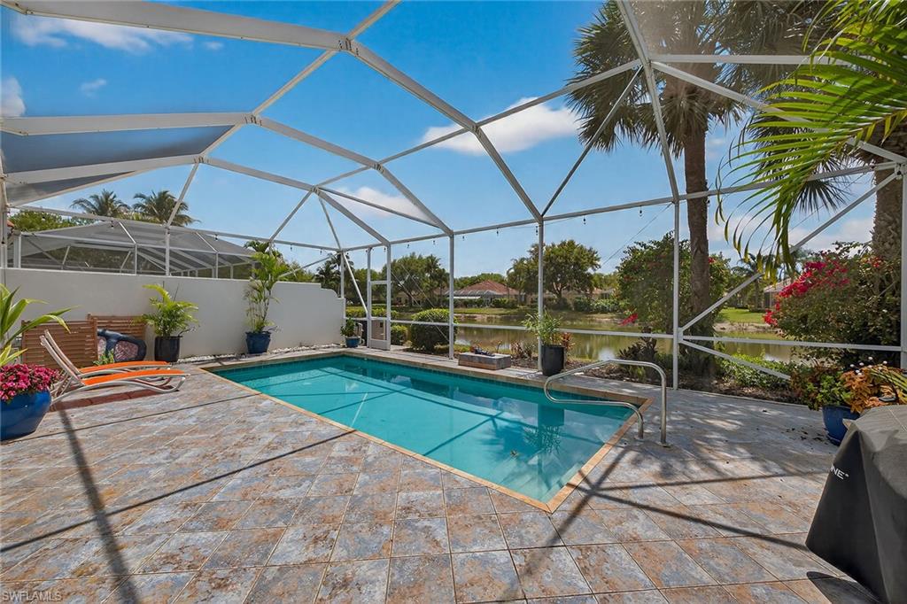 4013 Trinidad Way Naples, FL 34119 - Photo 26 of 35 a view of outdoor space with seating area