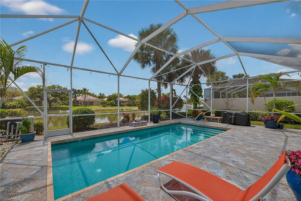 4013 Trinidad Way Naples, FL 34119 - Photo 27 of 35 a view of a backyard with sitting area