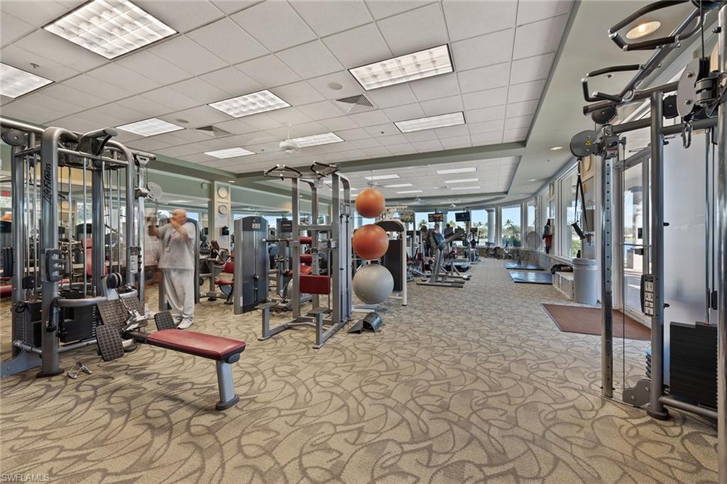 4013 Trinidad Way Naples, FL 34119 - Photo 30 of 35 a view of a room with gym equipment