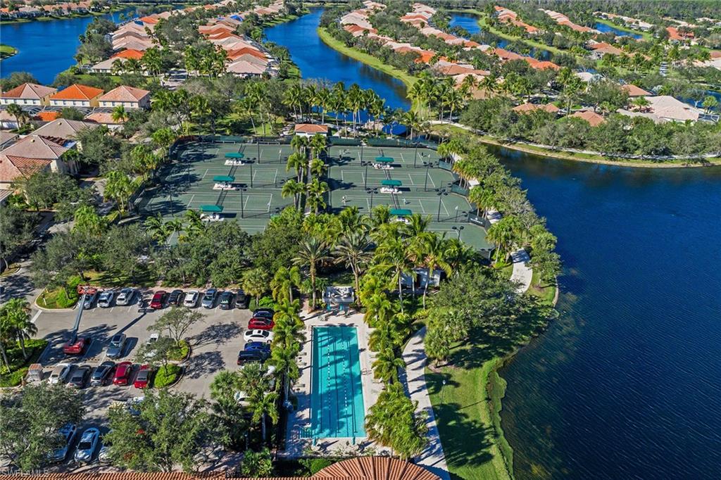 4013 Trinidad Way Naples, FL 34119 - Photo 35 of 35 an aerial view of residential houses with outdoor space and trees all around