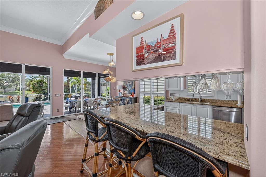 4013 Trinidad Way Naples, FL 34119 - Photo 9 of 35 a very nice looking dining room with a large window