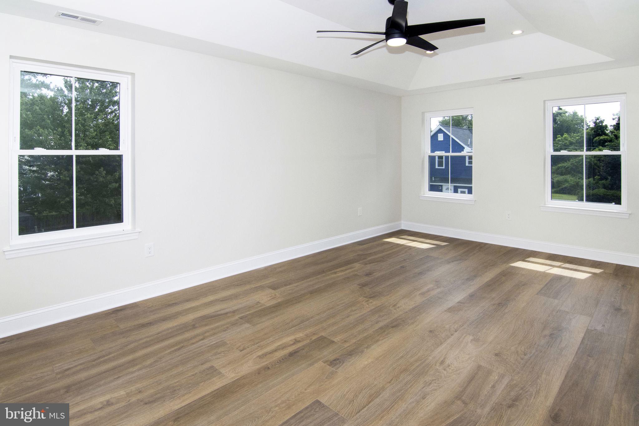 903 Mercer Street Cherry Hill, NJ 08002 - Photo 25 of 58 wooden floor in an empty room with a window