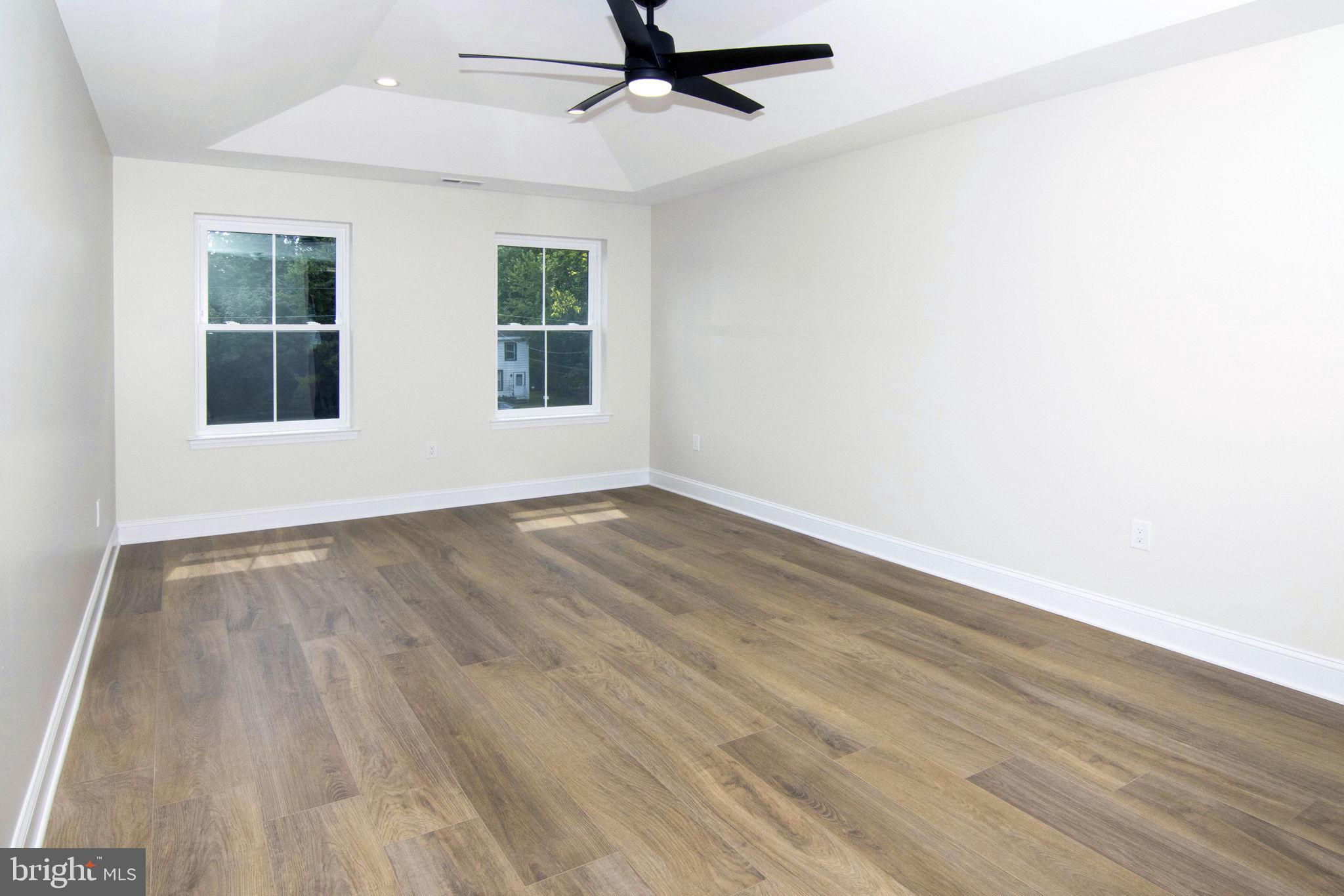 903 Mercer Street Cherry Hill, NJ 08002 - Photo 26 of 58 wooden floor in an empty room with a window