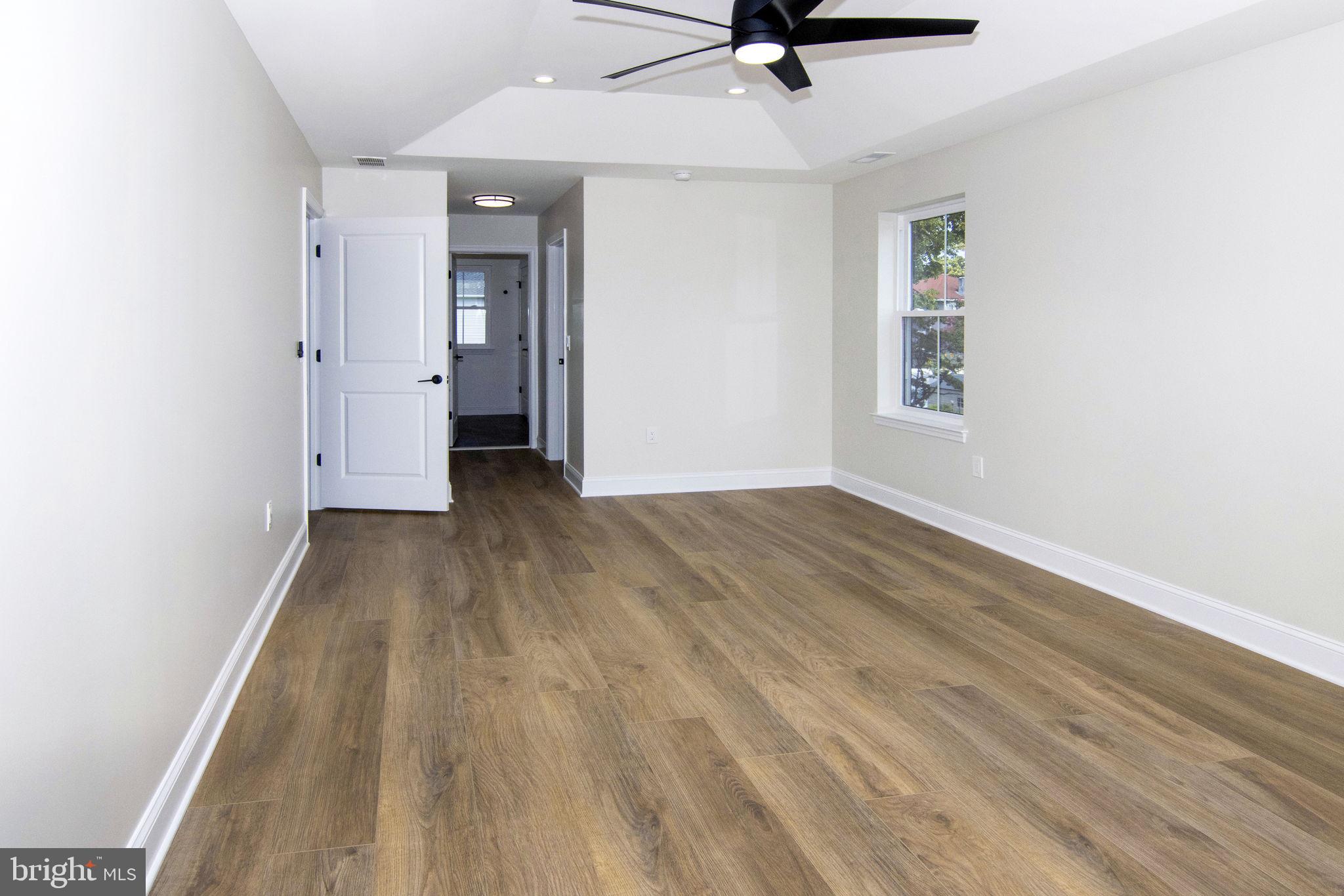 903 Mercer Street Cherry Hill, NJ 08002 - Photo 27 of 58 wooden floor in an empty room with a window