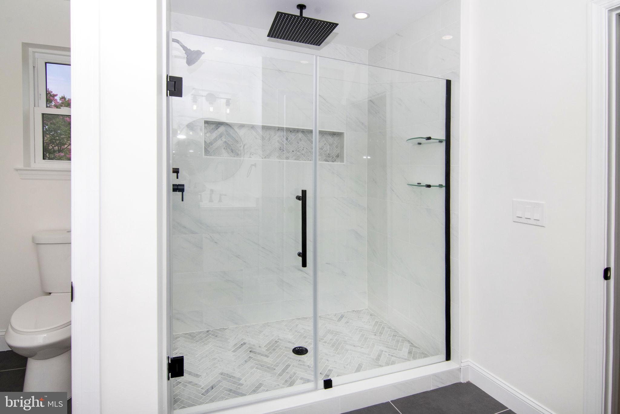 903 Mercer Street Cherry Hill, NJ 08002 - Photo 30 of 58 a bathroom with a shower and toilet