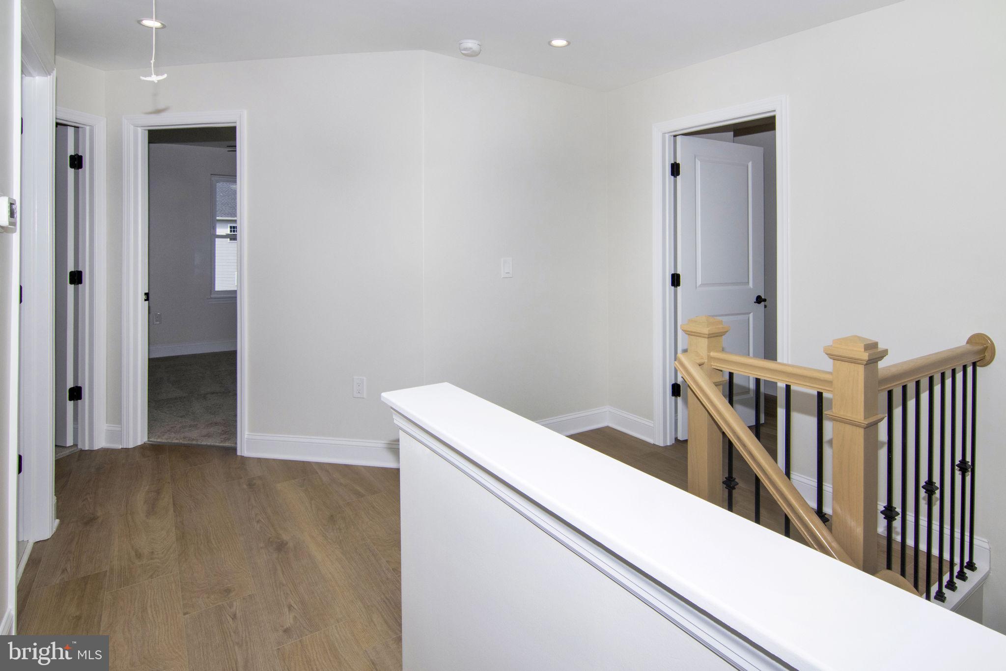 903 Mercer Street Cherry Hill, NJ 08002 - Photo 45 of 58 a view of hallway with wooden floor