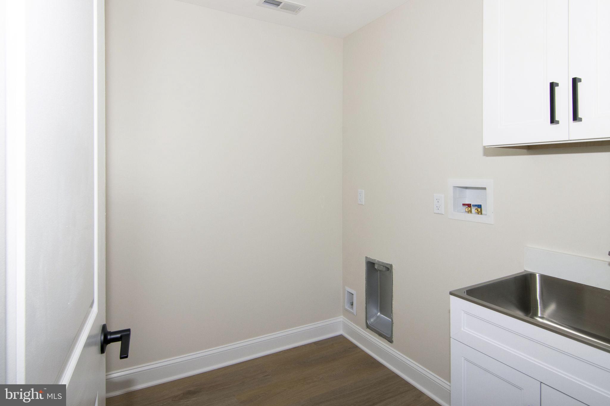 903 Mercer Street Cherry Hill, NJ 08002 - Photo 47 of 58 a bathroom with a sink and vanity