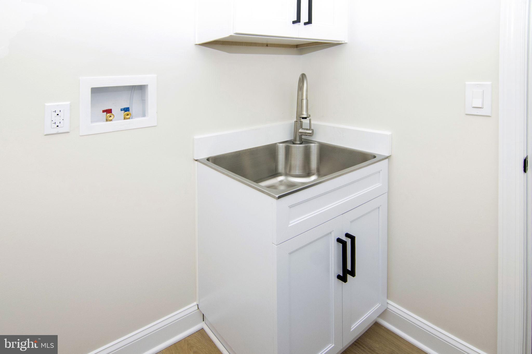 903 Mercer Street Cherry Hill, NJ 08002 - Photo 48 of 58 a bathroom with a sink and vanity