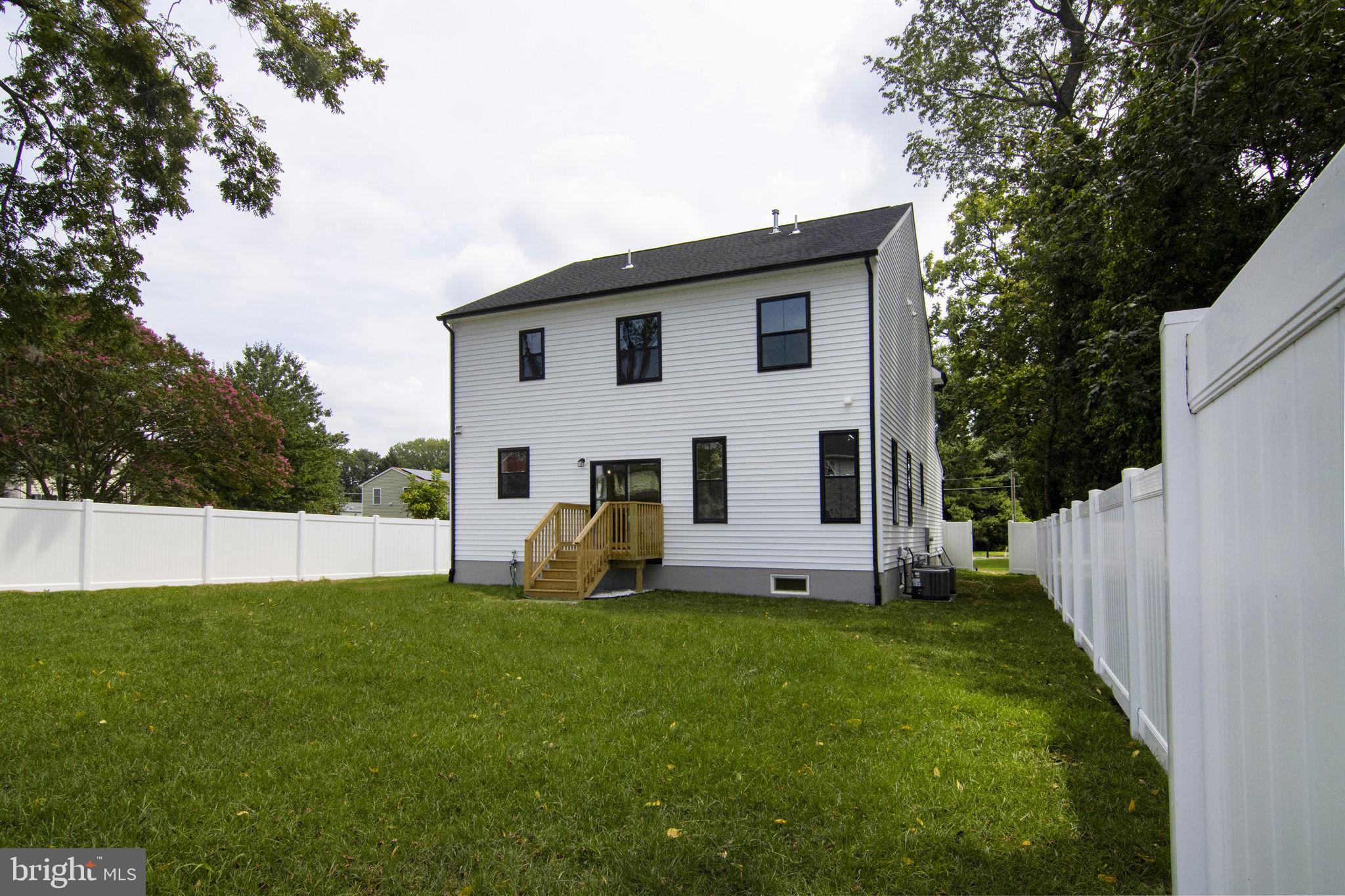 903 Mercer Street Cherry Hill, NJ 08002 - Photo 55 of 58 a view of a house with a yard and sitting area