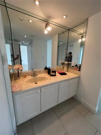 a view of a livingroom with an empty space and a window