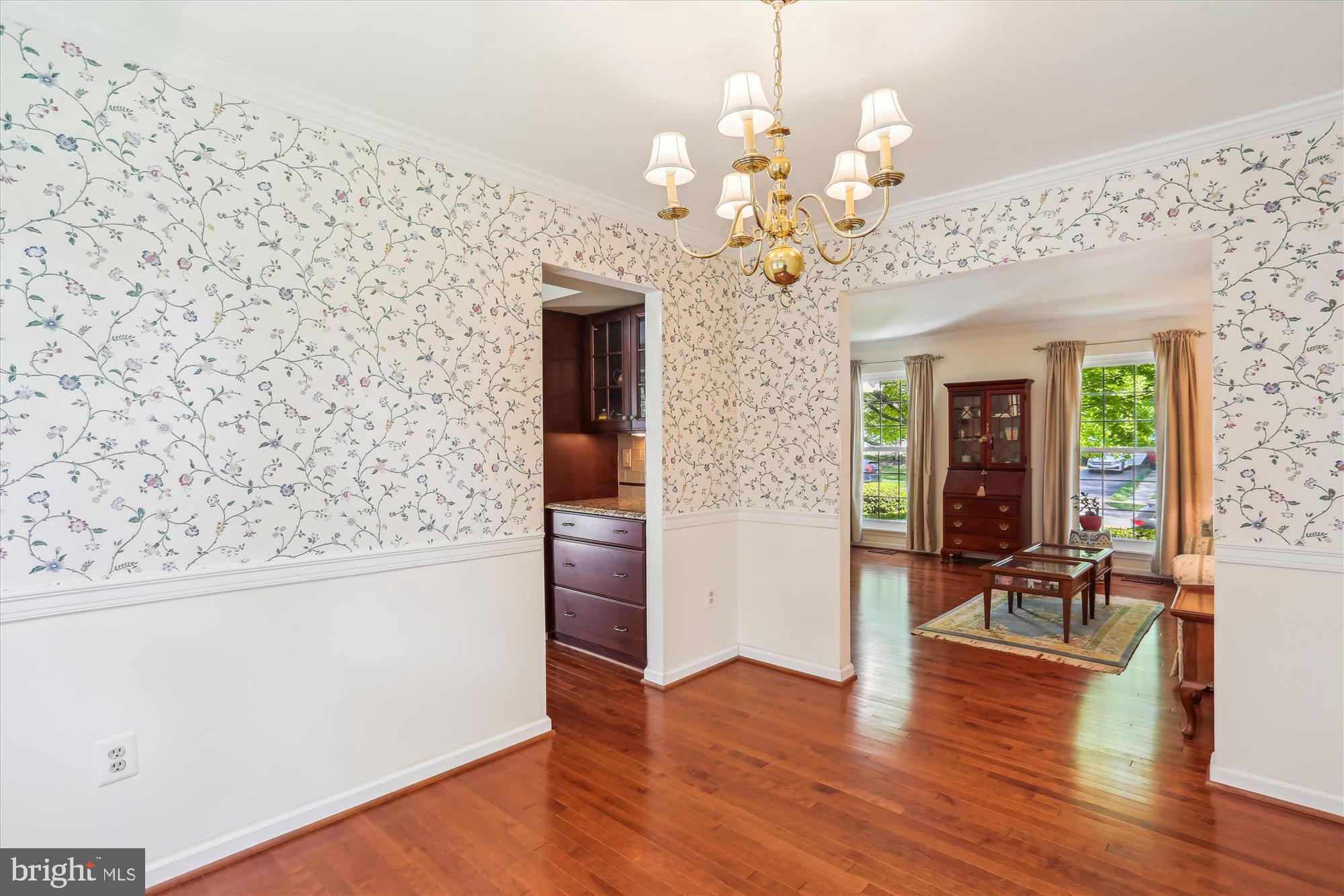 207 Rabbitt Road Gaithersburg, MD 20878 - Photo 11 of 38 a view of a livingroom with furniture wooden floor chandelier