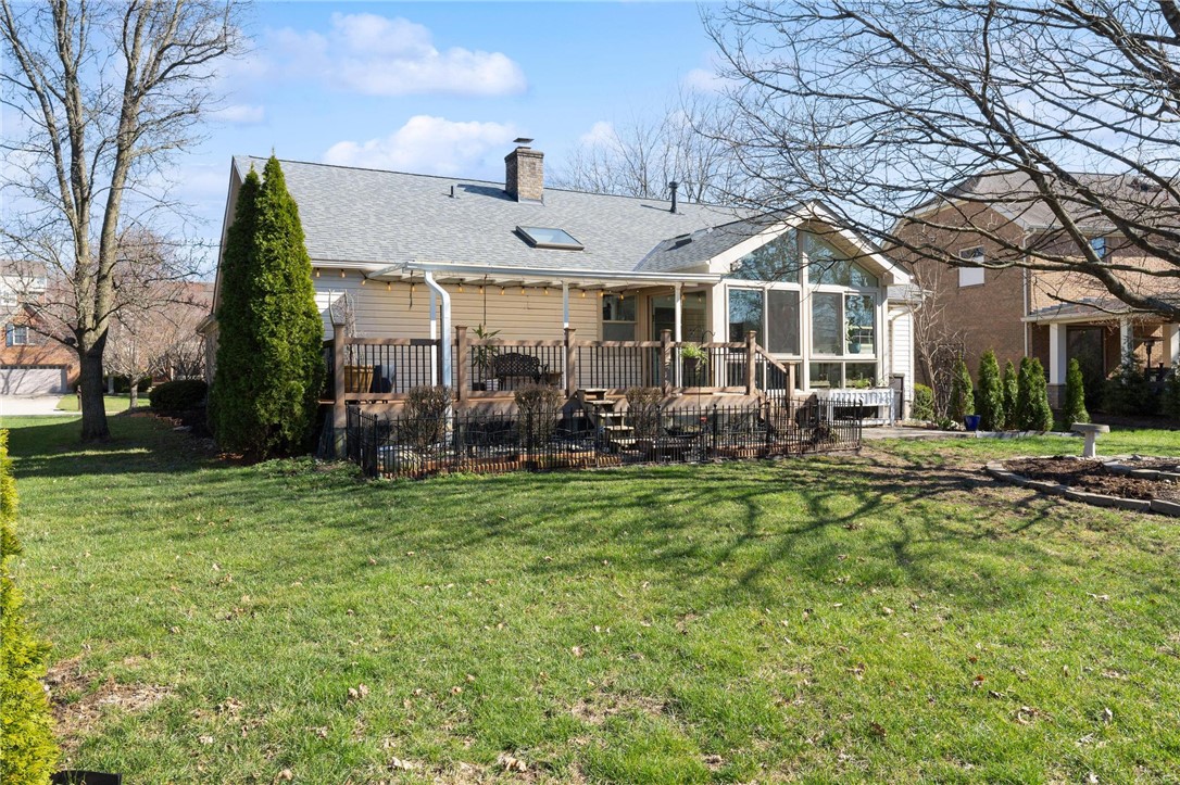 8781 Rupp Farm Drive West Chester, OH 45069 - Photo 46 of 48 This residence features a spacious yard, deck, and a sunroom perfect for relaxation.
