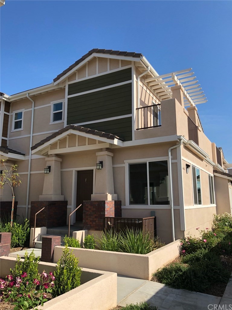 4616 Peck Road, Unit F El Monte, CA 91732 - Photo 1 of 1 a front view of a house with a yard