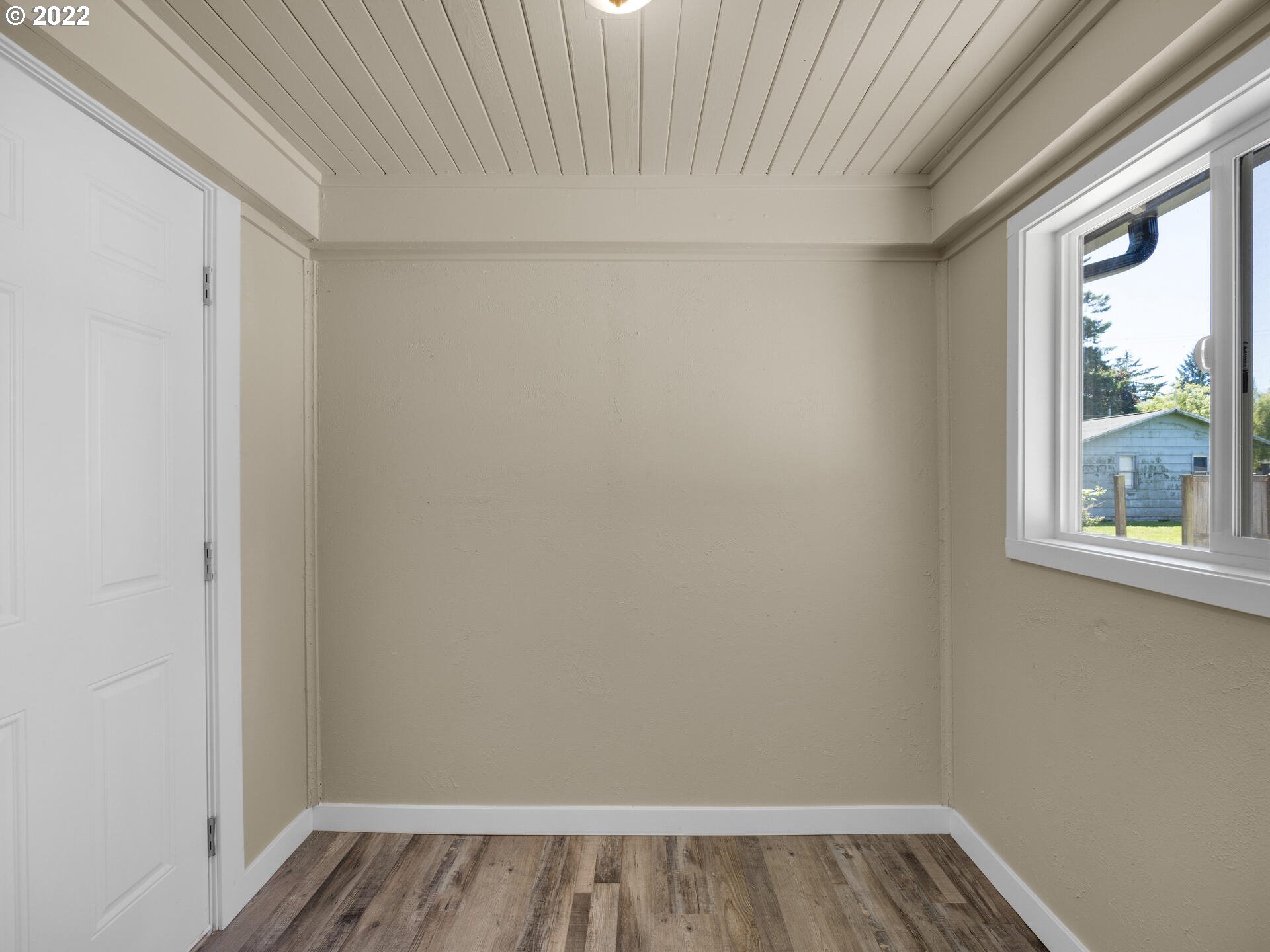 92356 E Road Astoria, OR 97103 - Photo 15 of 31 a view of a small space with wooden floor and a window