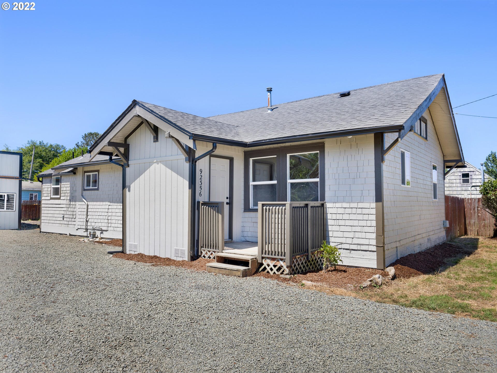 92356 E Road Astoria, OR 97103 - Photo 2 of 31 a view of a house with garage