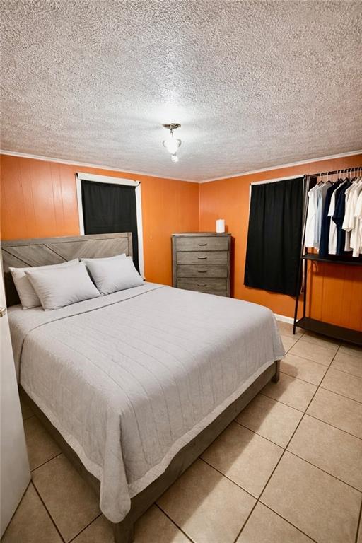 3911 Blackstock Road Talmo, GA 30575 - Photo 12 of 17 a bedroom with a bed and night stand