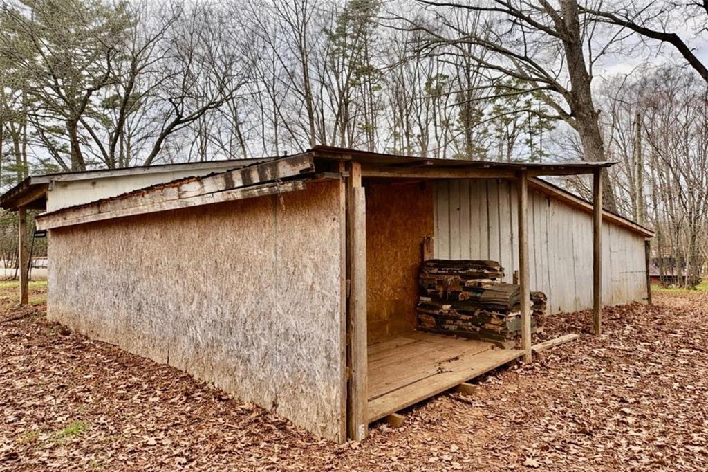 3911 Blackstock Road Talmo, GA 30575 - Photo 15 of 17 a backyard of a house with lots of green space
