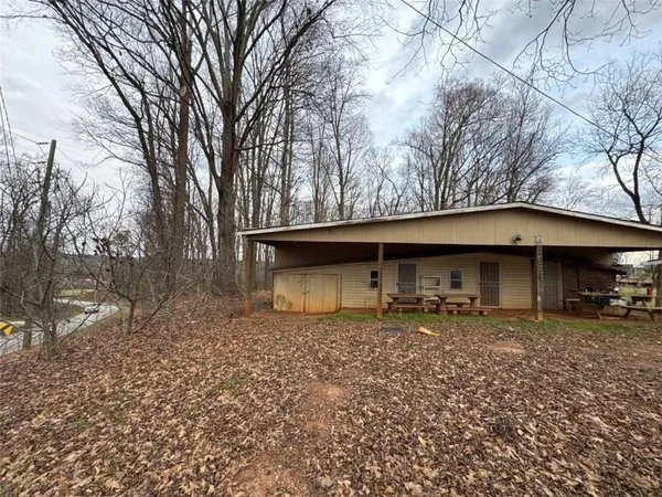 a house with trees in front of it