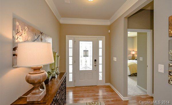 4282 Perth Road, Unit 315 Indian Land, SC 29707 - Photo 2 of 12 a view of a hallway with furniture and front door