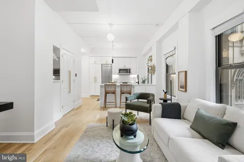 a bedroom with a bed and walk in closet