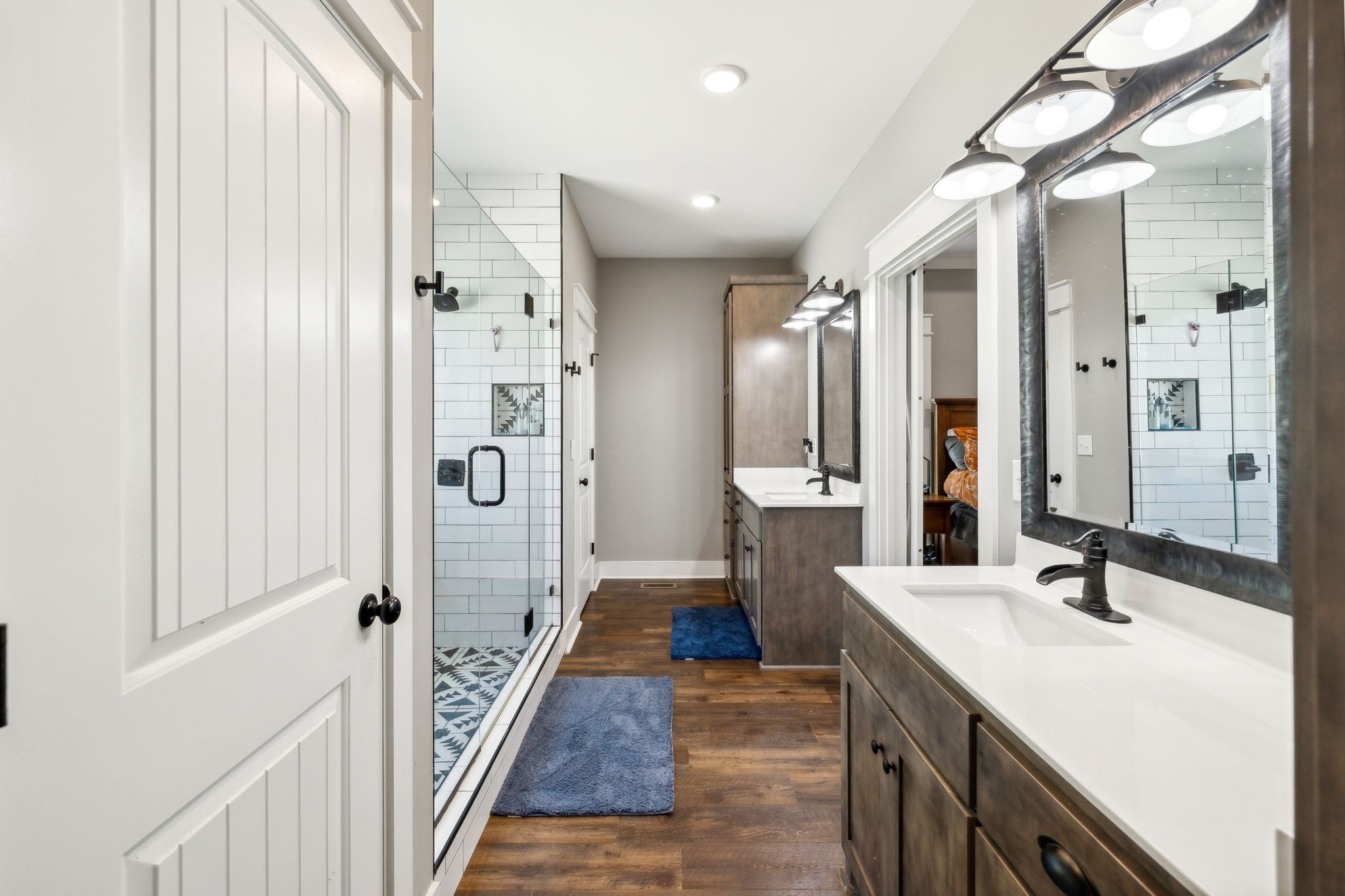 1338 Norton Road Manchester, TN 37355 - Photo 24 of 55 a bathroom with a double vanity sink and mirror