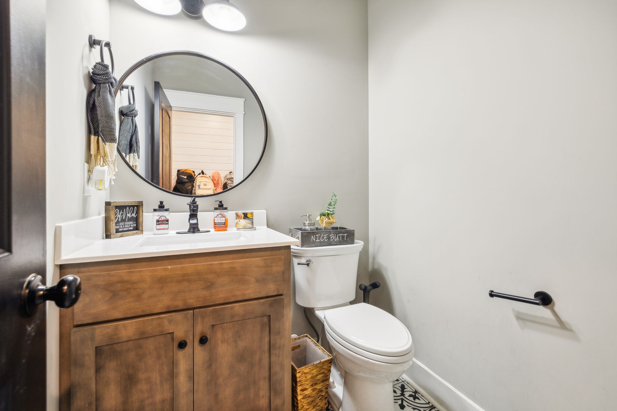 1338 Norton Road Manchester, TN 37355 - Photo 29 of 55 a bathroom with a toilet a sink and a mirror
