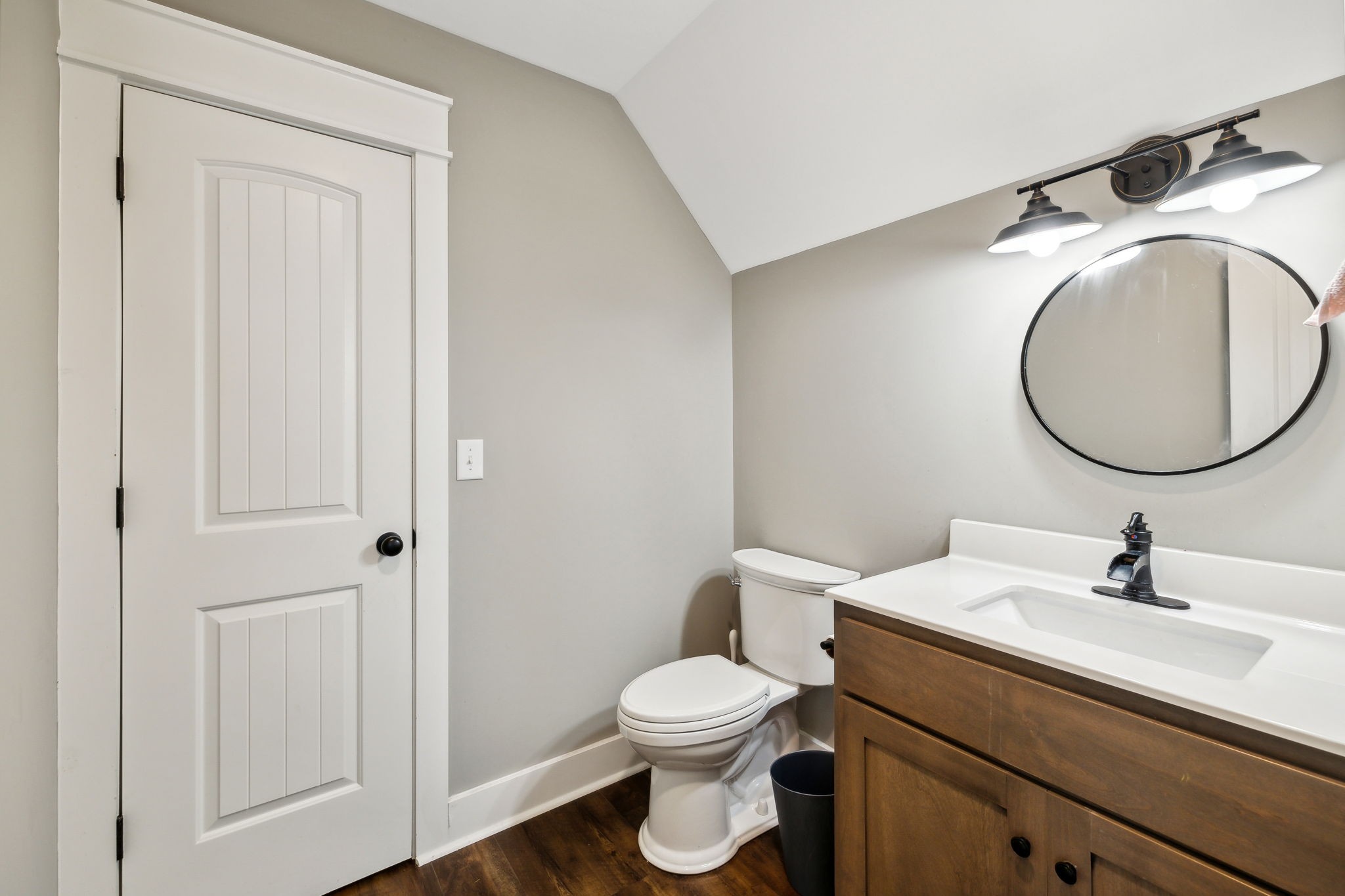 1338 Norton Road Manchester, TN 37355 - Photo 41 of 55 a bathroom with a toilet sink and mirror