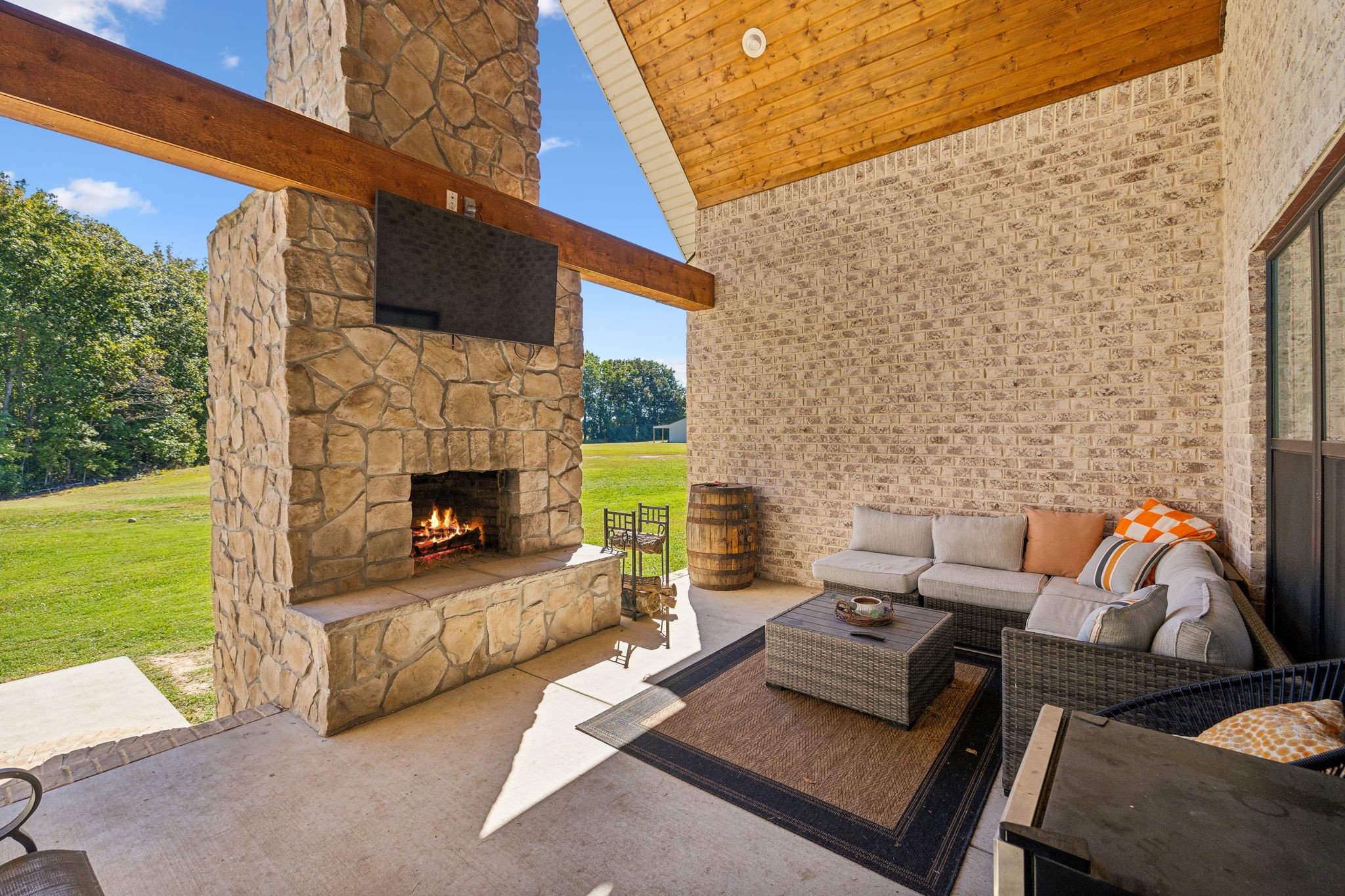 1338 Norton Road Manchester, TN 37355 - Photo 48 of 55 a view of a patio with couches chairs and a yard