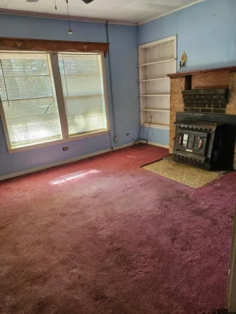 an empty room with windows