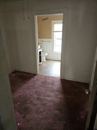 a view of a room that has a window