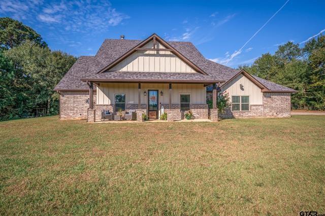 2151 Byrd Road Jacksonville, TX 75766 - Photo 2 of 40 a front view of a house with a yard