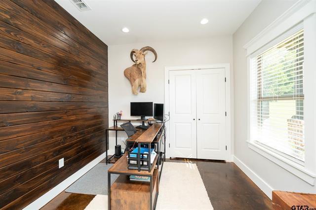 2151 Byrd Road Jacksonville, TX 75766 - Photo 5 of 40 Home office with wood walls and recessed lighting