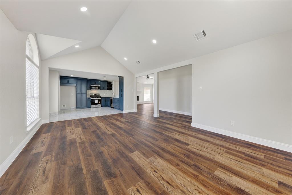 607 Rawlins Drive Lancaster, TX 75146 - Photo 8 of 26 a view of empty room with wooden floor