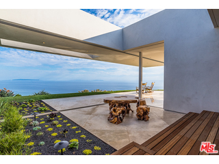 20659 Rockcroft Drive Malibu, CA 90265 - Photo 5 of 33 a view of a living room and dining room